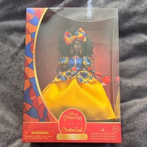 Disney Princess Doll in Vibrant Yellow and Blue Attire